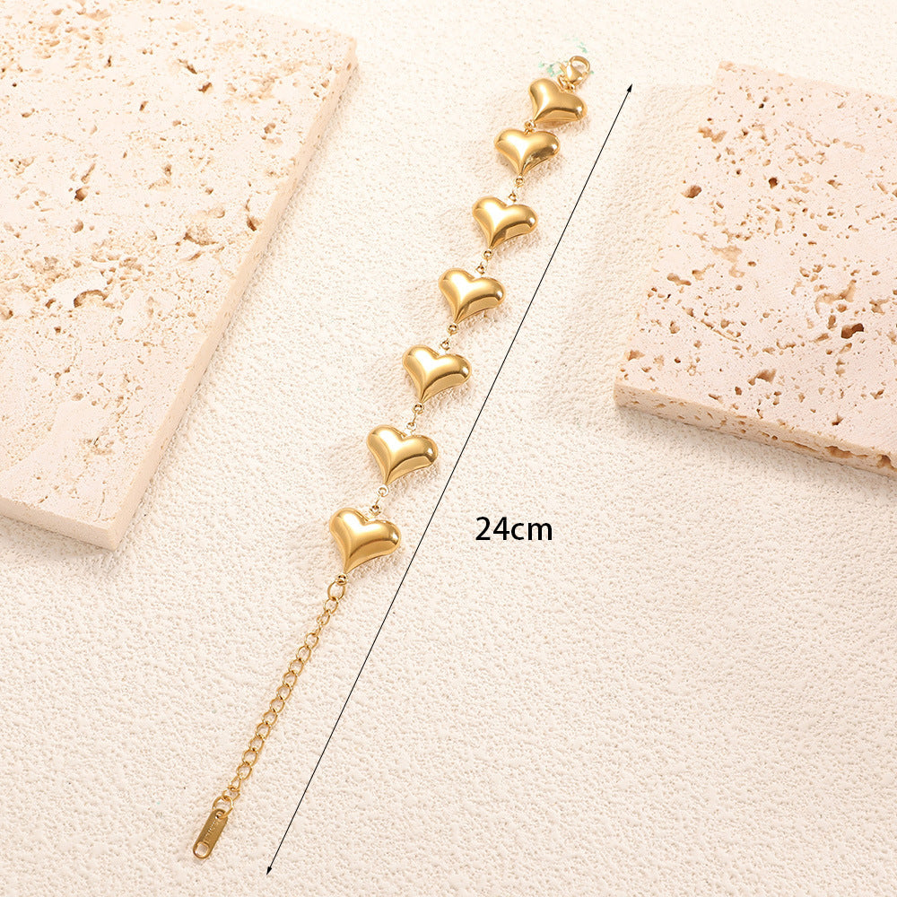 Ladies' bracelet with elegant heart design and fine link chain Symbol Fashion