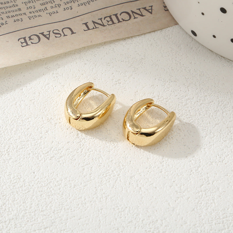 Women's Hoop Earrings with Elegant Curved Design Symbol Fashion