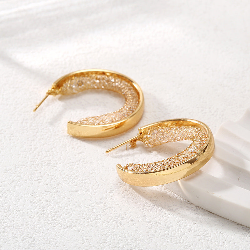 Ladies Hanging Earrings with Innovative, Gold-colored Design Symbol Fashion
