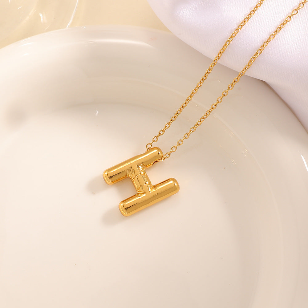 Women's necklace with curved letter pendant Symbol Fashion