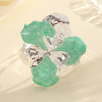 Women's flower-shaped ring made of shiny metal and high-quality epoxy resin Symbol Fashion