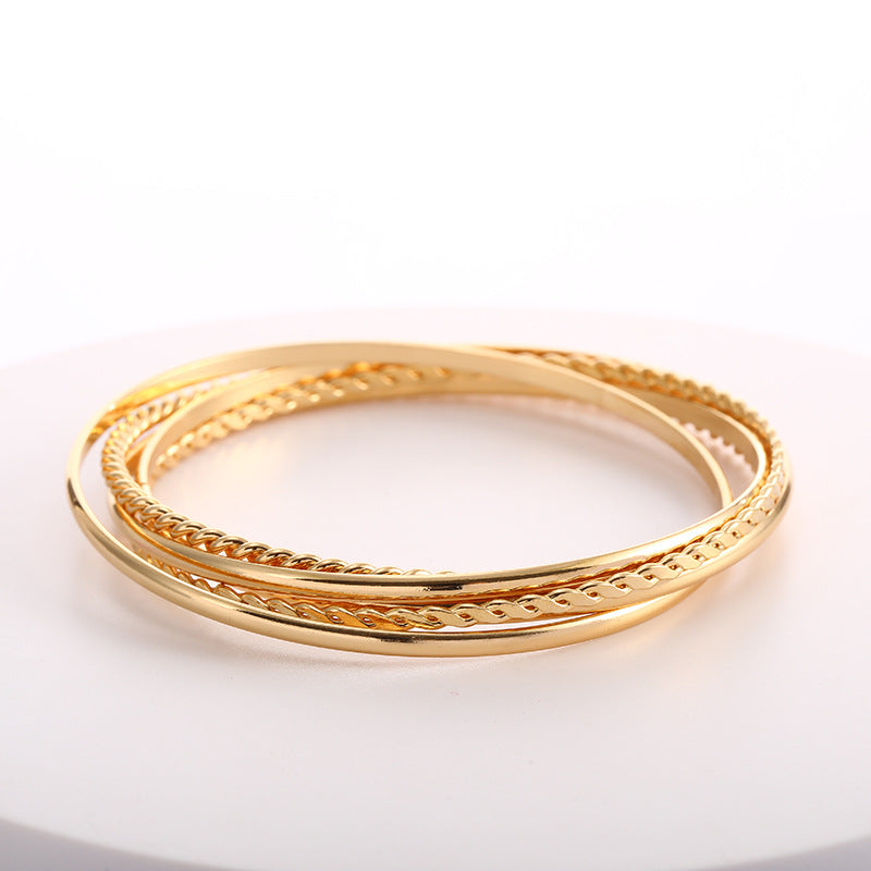 Women's bangle set with elaborate, braided and simple designs Symbol Fashion