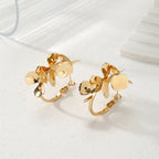 Ladies Creoles with artistic floral ornament Symbol Fashion
