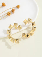 Women's bracelet with structured, golden beads Symbol Fashion