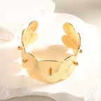 Women Open Bangle with Artistic Relief Design Symbol Fashion
