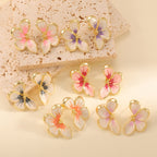 Women's ear clips in elegant floral design with a glossy coating Symbol Fashion
