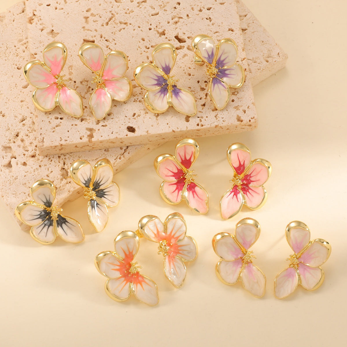 Women's ear clips in elegant floral design with a glossy coating Symbol Fashion