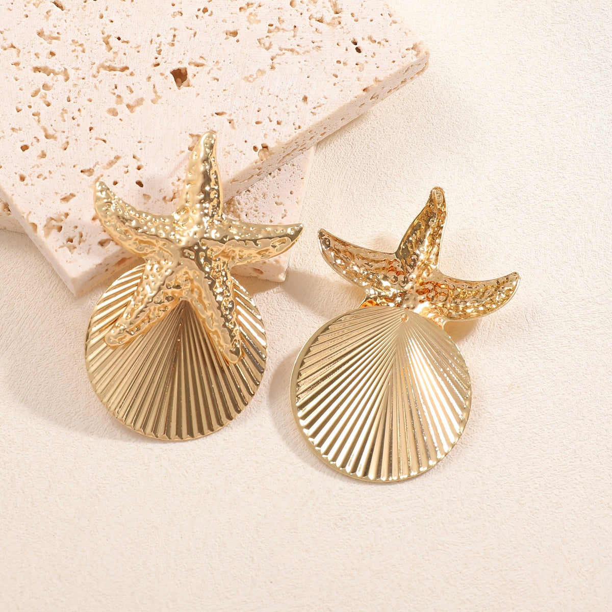 Women's ear clips in luxurious shell and starfish design Symbol Fashion