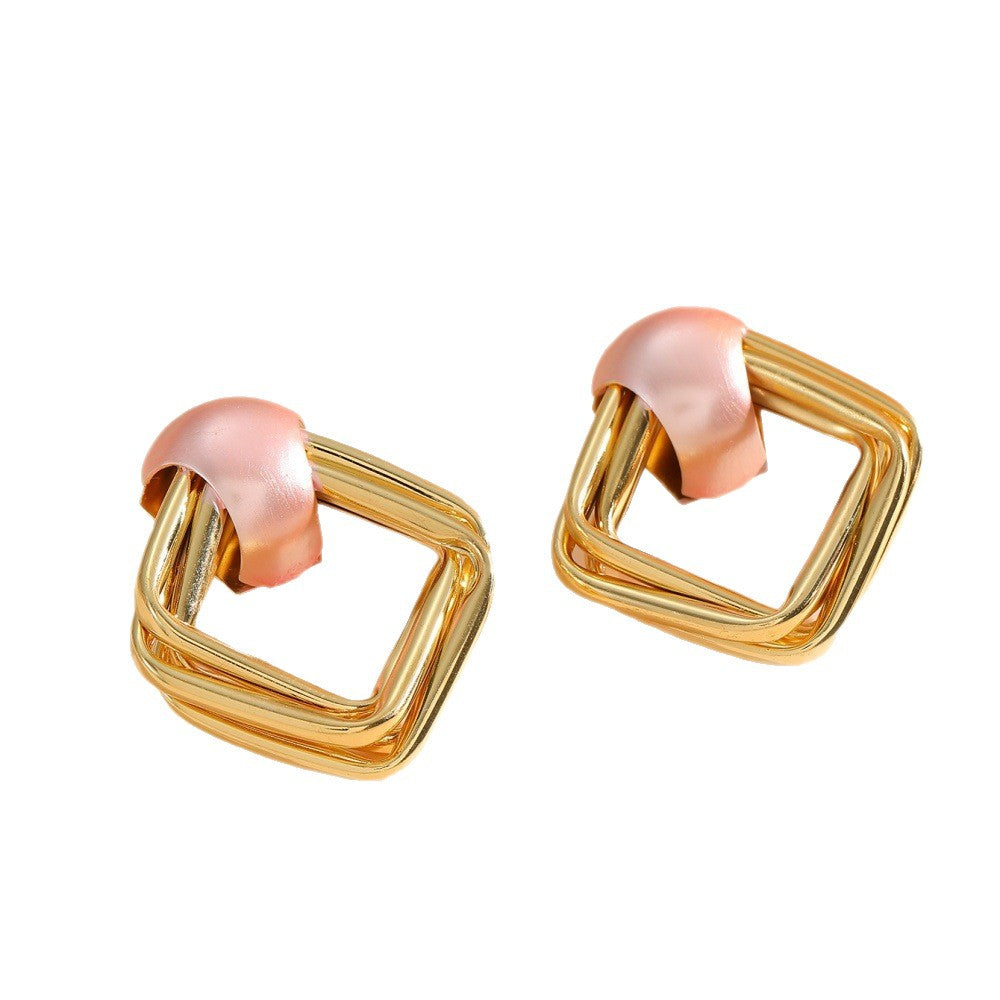 Women modern earrings with asymmetrical design Symbol Fashion