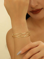 Ladies' bangle with elegant curved design Symbol Fashion