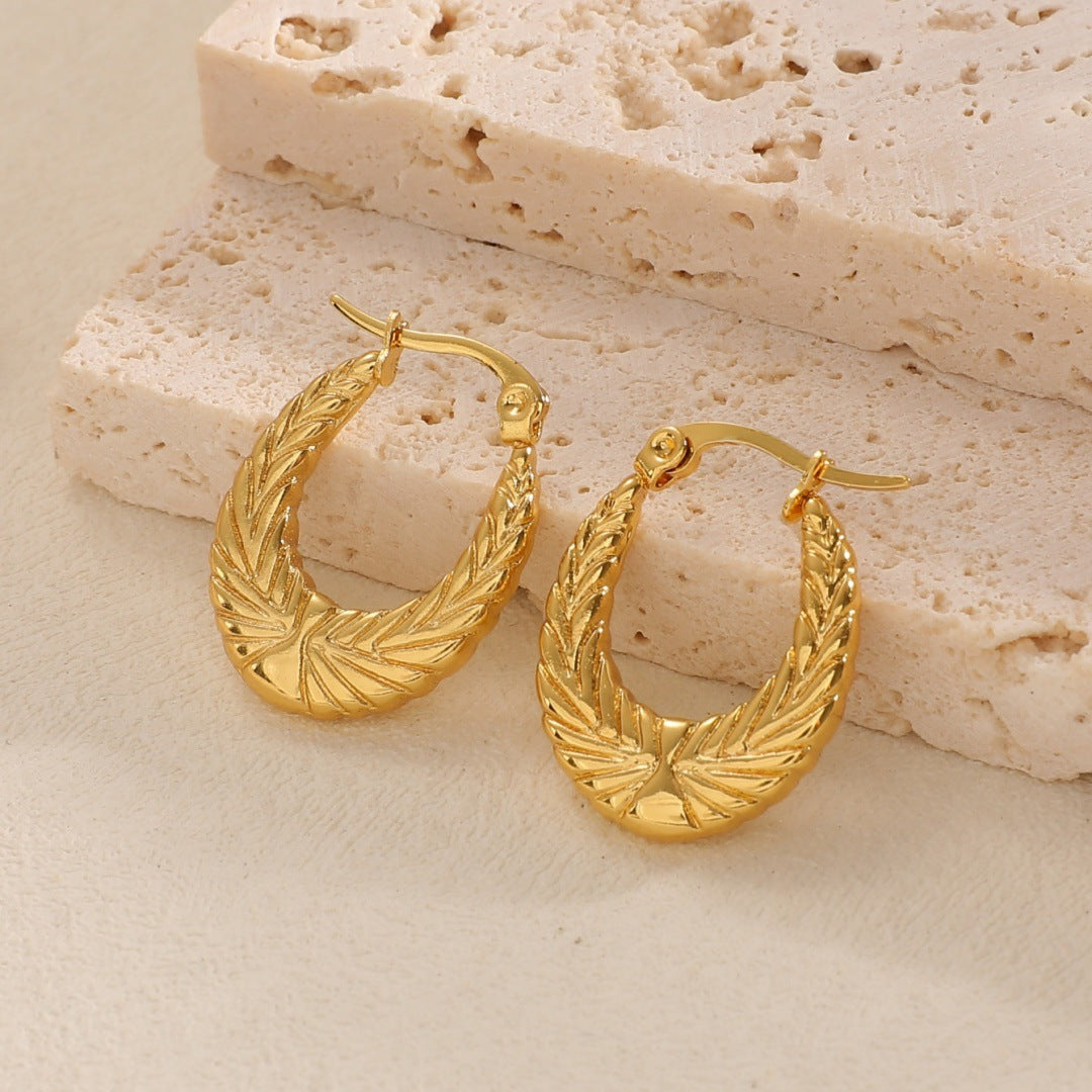 Women's Hanging Earrings with Integrated, Textured Design Symbol Fashion