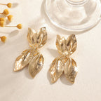 Ladies earrings in elegant leaf design Symbol Fashion