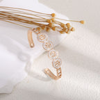 Women's bangle with elegant infinity pattern and sparkling zirconia Symbol Fashion