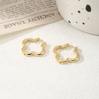 Ladies hoops in unique, sculptural design Symbol Fashion