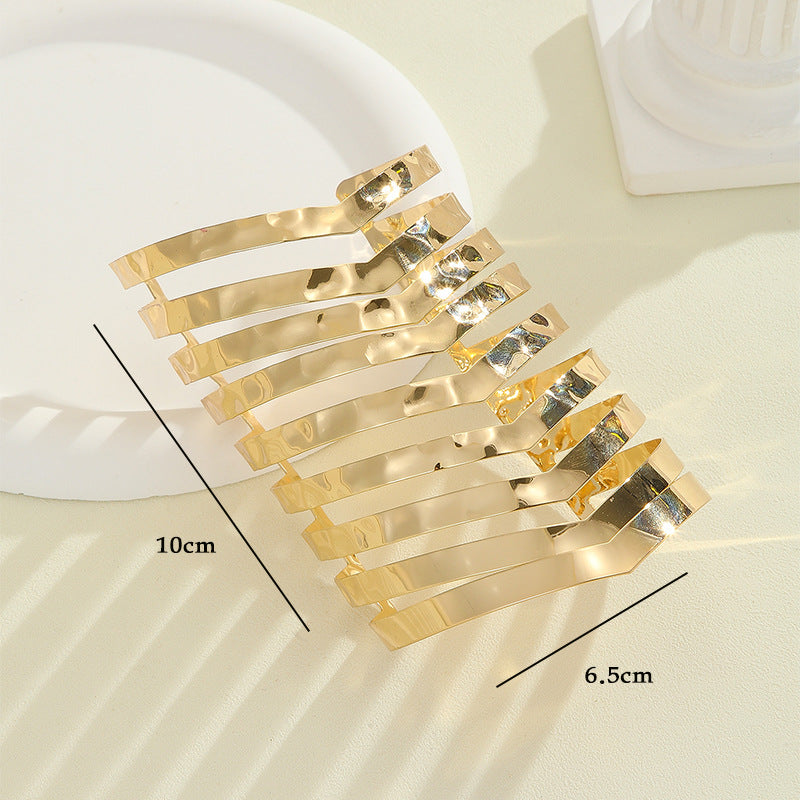 Women's hair accessories with shiny, curved elements Symbol Fashion