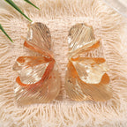 Women's ear clips in an elegant, textured design Symbol Fashion