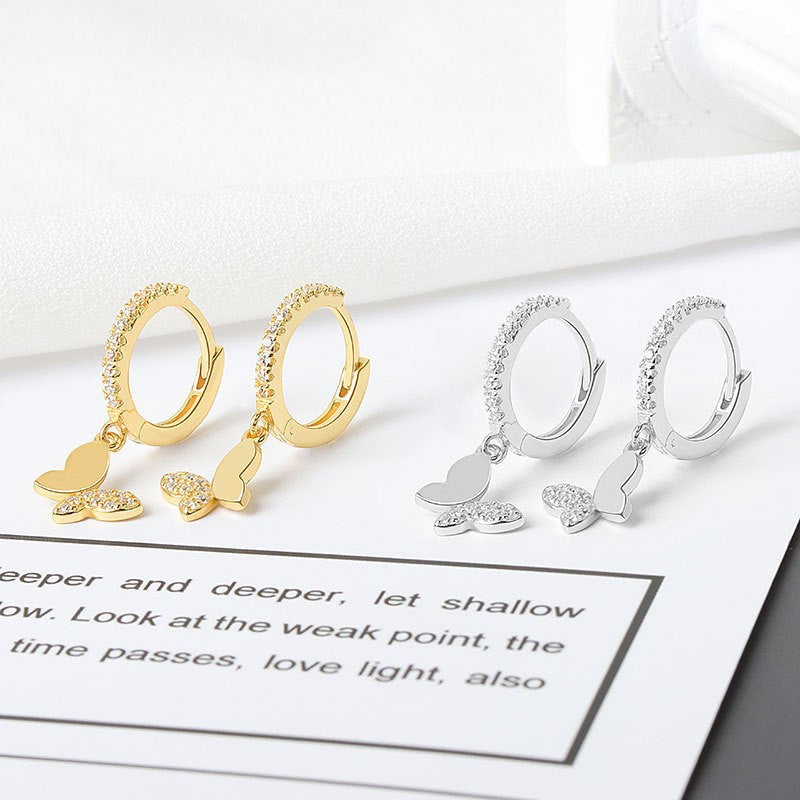 Ladies earrings with elegant butterfly design and sparkling details Symbol Fashion