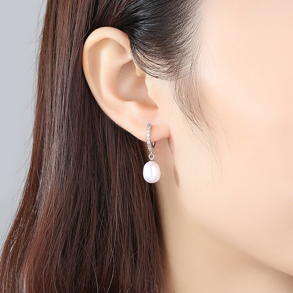 Ladies earrings with elegant zirconia decorations and pearl pendants Symbol Fashion