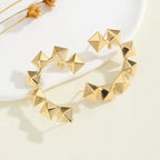Women's bracelet with structured, golden beads Symbol Fashion