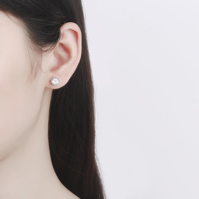 Ladies earrings with sparkling zirconia in elegant wreath design Symbol Fashion