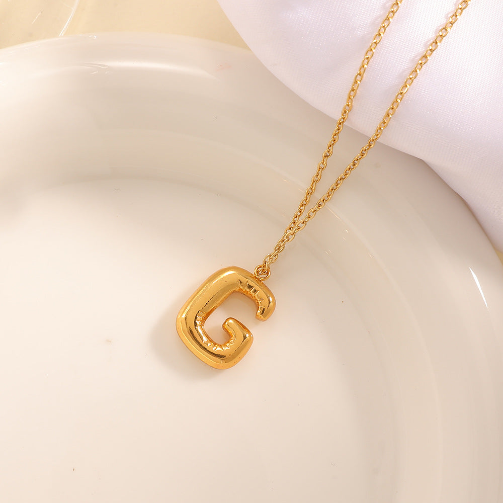 Women's necklace with curved letter pendant Symbol Fashion