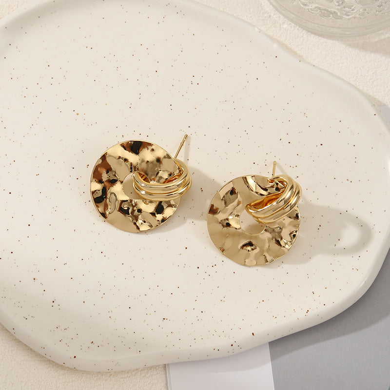 Women's elegant earrings with rustic, folded design Symbol Fashion