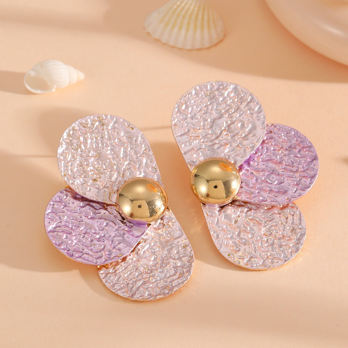 Women's ear clips in elaborate floral pattern Symbol Fashion