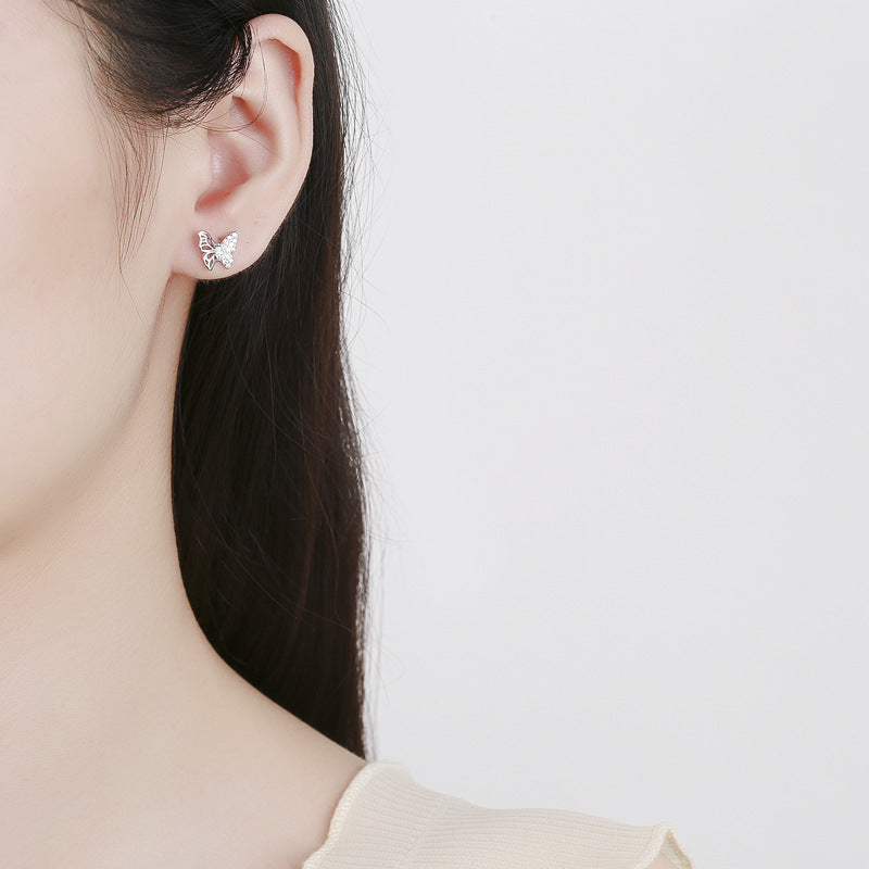 Ladies earrings in an elegant butterfly design with sparkling zirconia Symbol Fashion