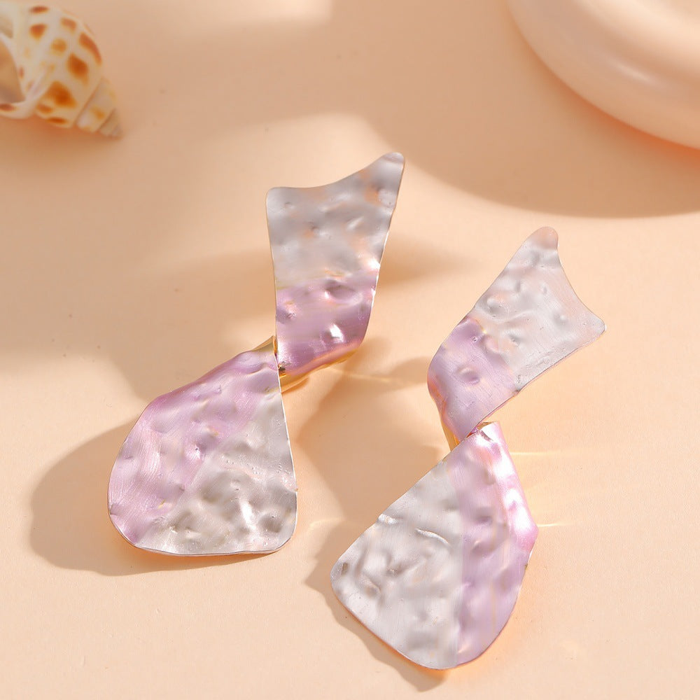 Ladies earrings in modern disc design Symbol Fashion