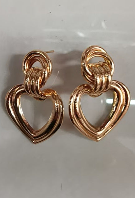 Women’s earrings in modern heart design Symbol Fashion