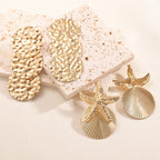 Women's ear clips in luxurious shell and starfish design Symbol Fashion