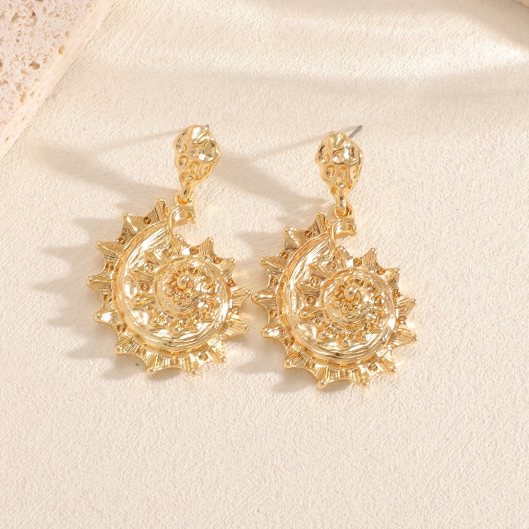 Ladies earrings in shell design Symbol Fashion