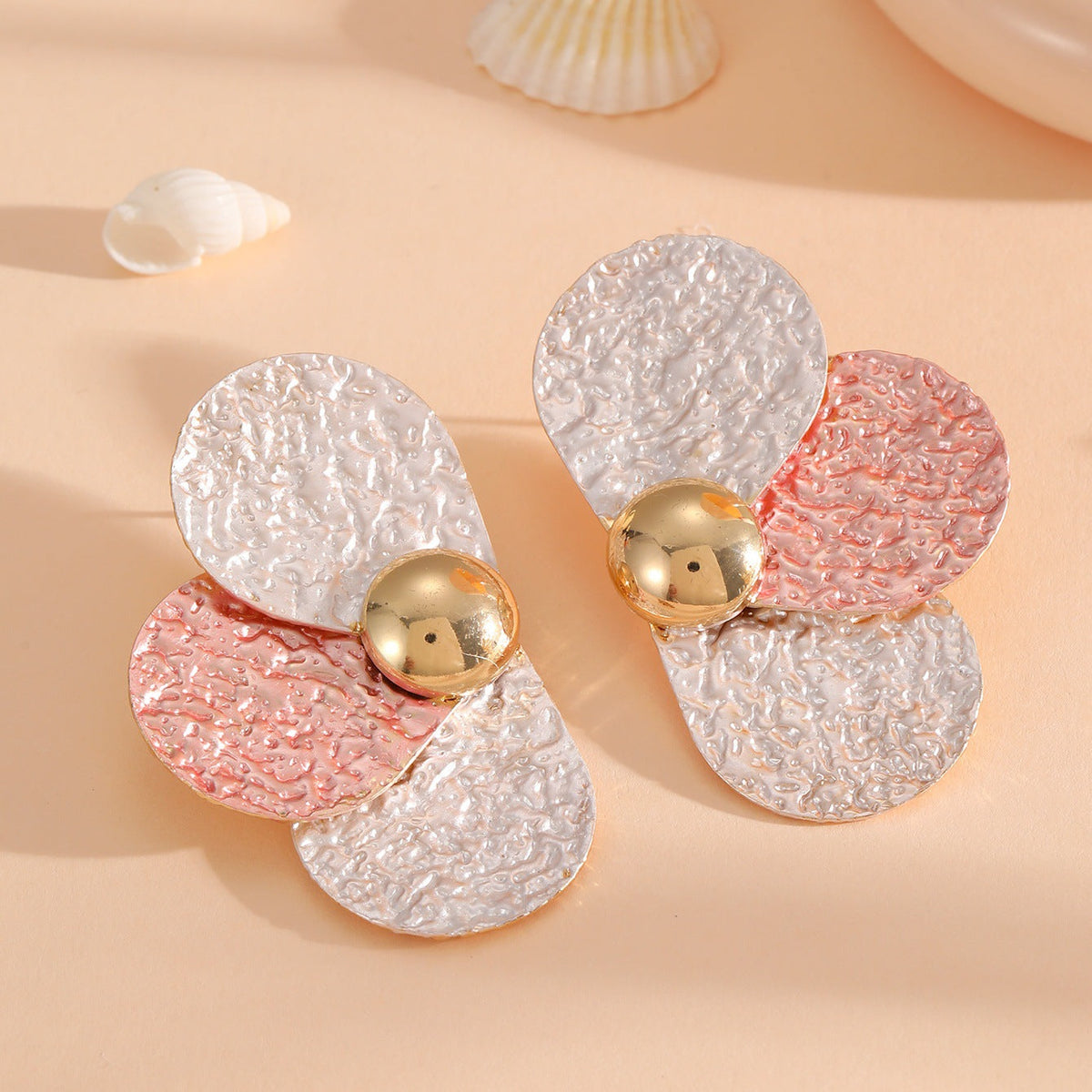 Women's ear clips in elaborate floral pattern Symbol Fashion