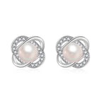 Ladies earrings with artistic pearl design and sparkling zirconia Symbol Fashion