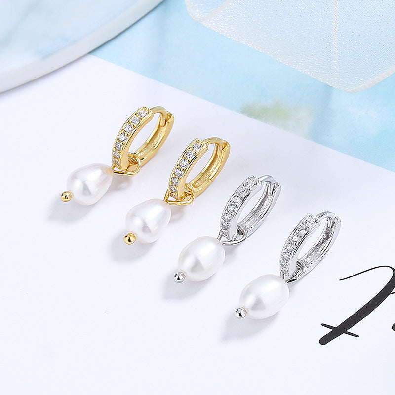 Ladies earrings with elegant zirconia decorations and pearl pendants Symbol Fashion
