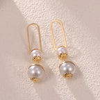 Ladies earrings with elegant pearl design Symbol Fashion