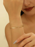 Ladies' bangle with elegant curved design Symbol Fashion