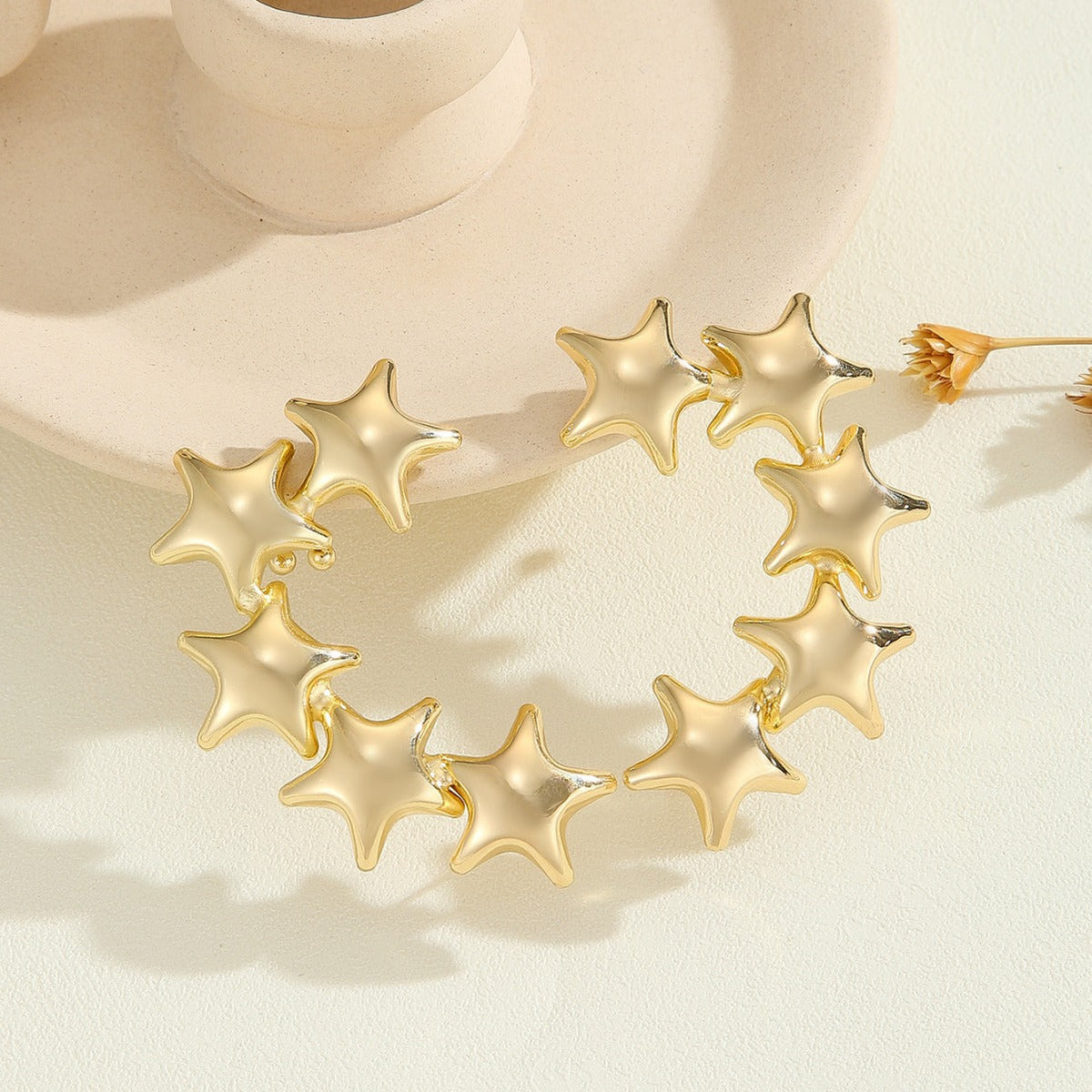 Women's bracelet with structured, golden beads Symbol Fashion