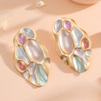 Ladies ear clips with elaborate, colorful shell design Symbol Fashion