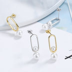 Women's stud earrings with modern oval design and elegant pearls Symbol Fashion