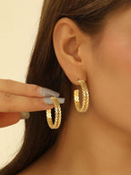 Women artistically designed hoops Symbol Fashion
