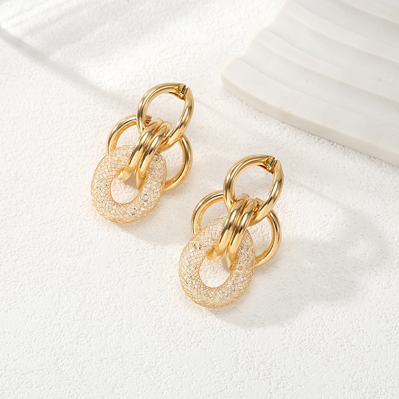 Ladies Hanging Earrings with Innovative, Gold-colored Design Symbol Fashion